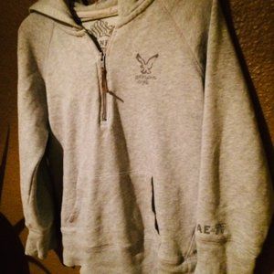 An American Eagle hooded cropped sweatshirt.